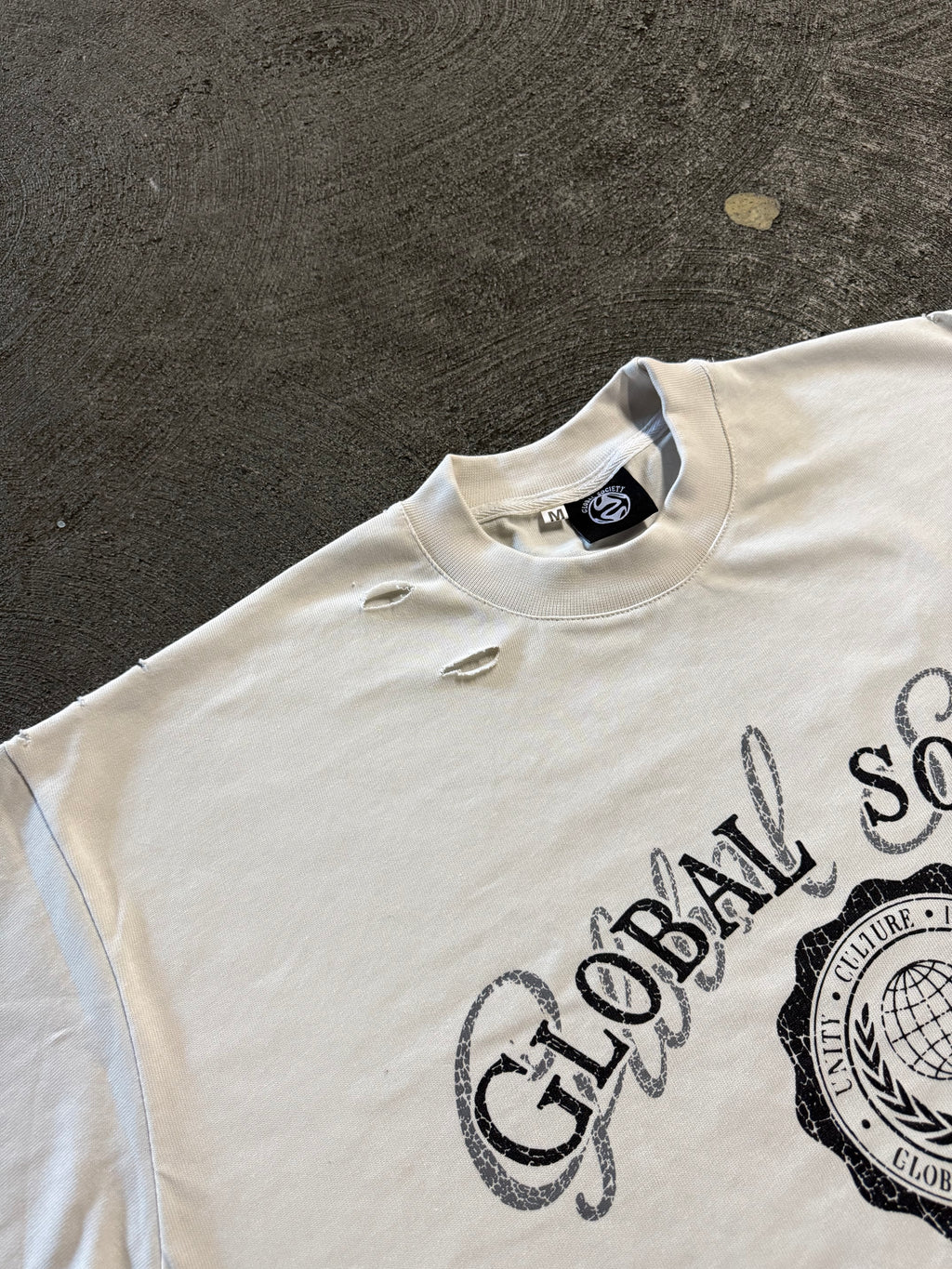 Unisex “One World One Piece” Tee