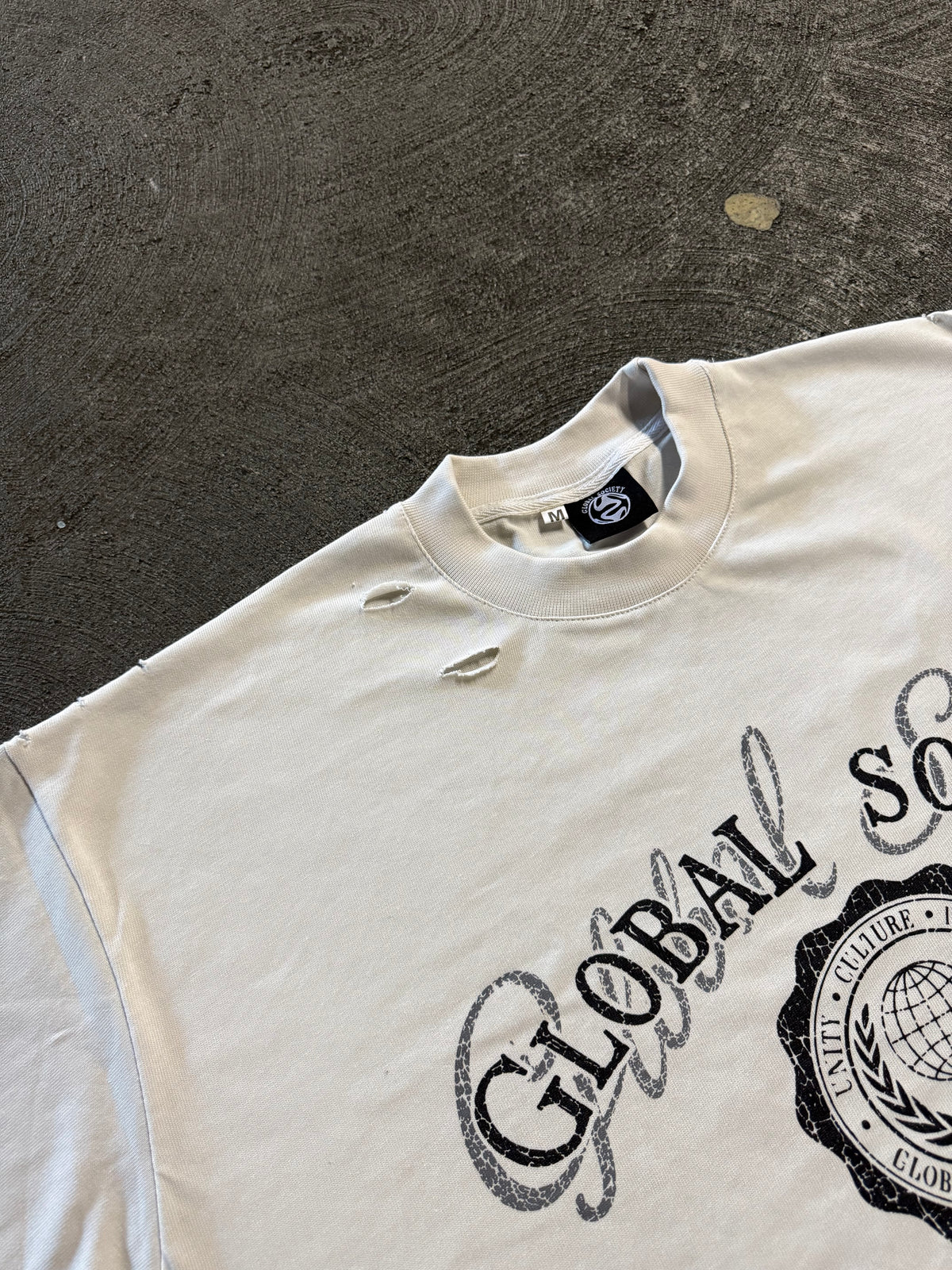 Unisex “One World One Piece” Tee